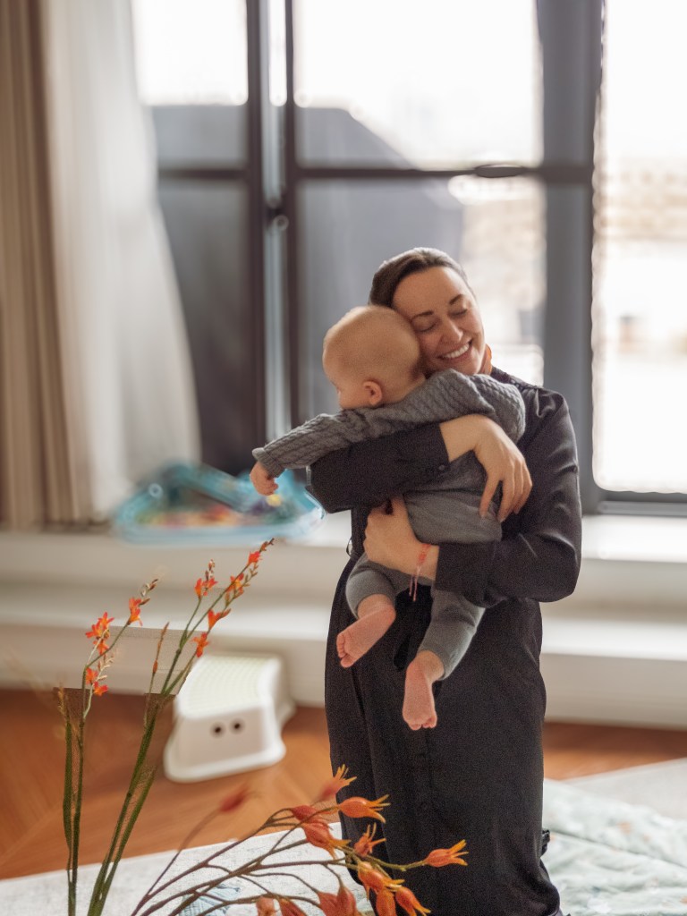 Stephanie and her son Nadi at their home in Shanghai